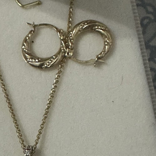 14k gold cross pendant with 9k long chain, reversible design