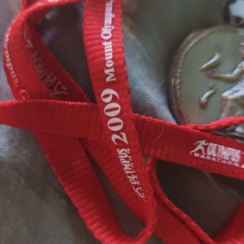 Olympus Marathon 2009 medal like new, authentic finishers medal