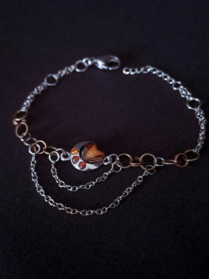 Bracelet with chains refurbished, steampunk style, mixed metal, 00's