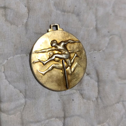 Track and field medal used in good condition