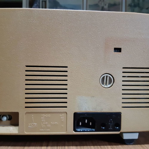 Pycb film projector used, with leather case and 3 children's cartoons