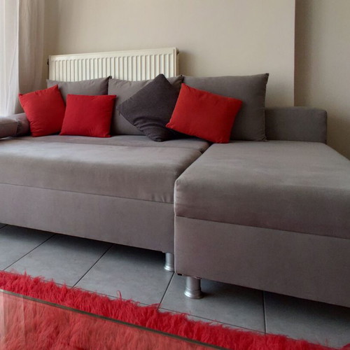 Corner sofa bed gray used with storage space