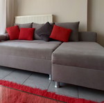 Corner sofa bed gray used with storage space