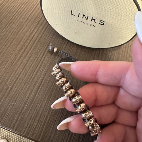 Links Of London collectible bracelet like new, rose gold and black cord