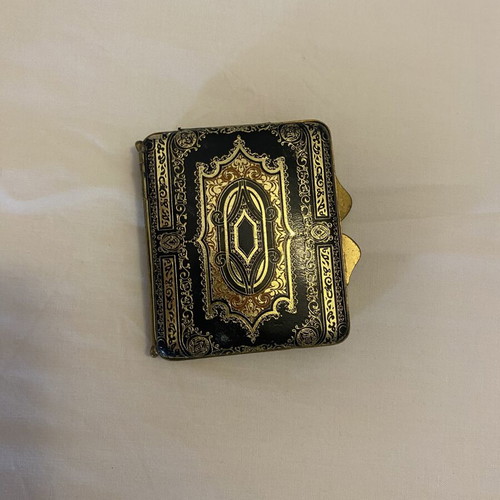 Vintage metal powder compact with mirror, used, black and gold enamel