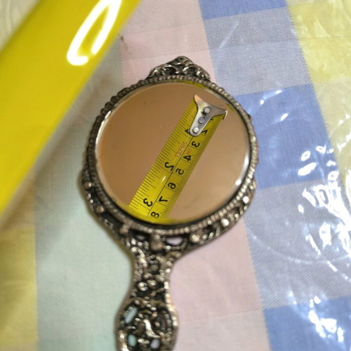 Vintage hand mirror used