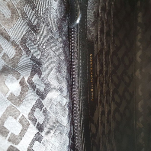 Embossed leather clutch like new, gray and silver