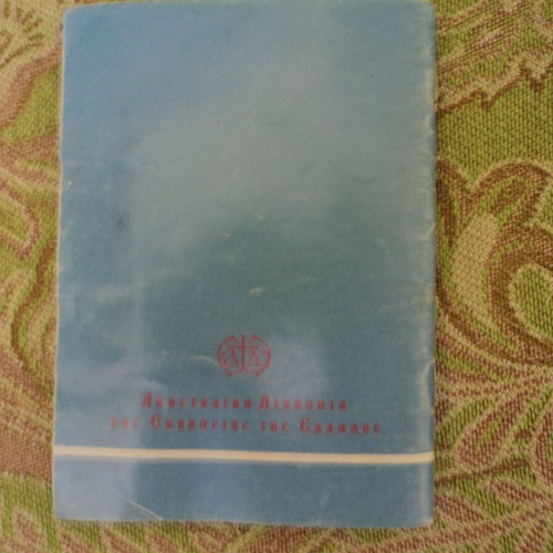 Album with over 50 used religious chromolithograph cards