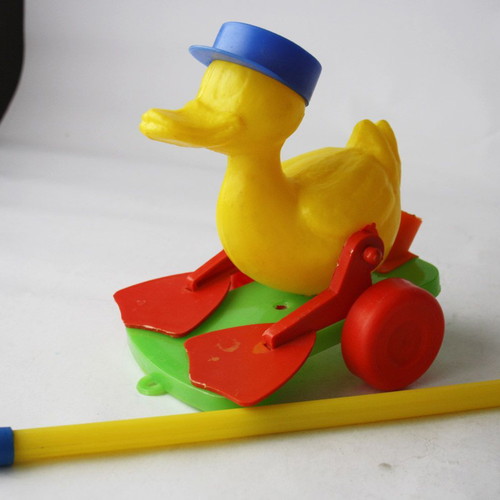 Plastic wheeled vintage 70's duck toy new with stick