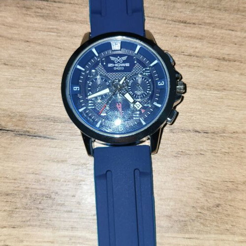 Men's wristwatch like new with blue silicone strap