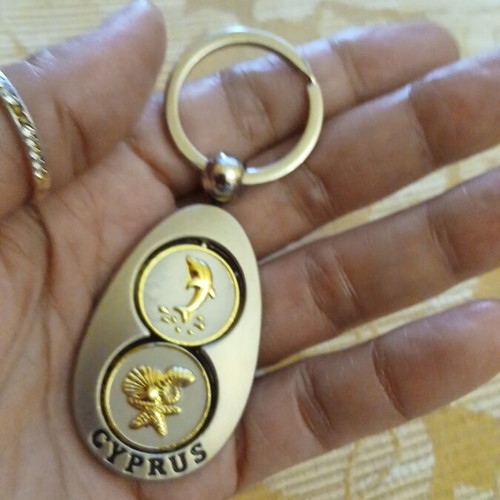 Collectible metal keychain Cyprus spinning, like new, gold and silver