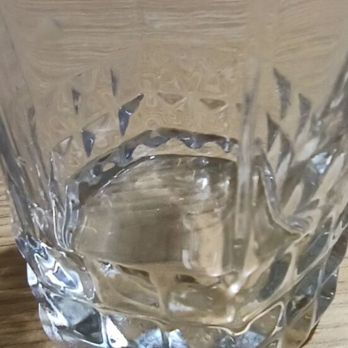 Water glass used, with DNA Aris, Elenas, Steliou
