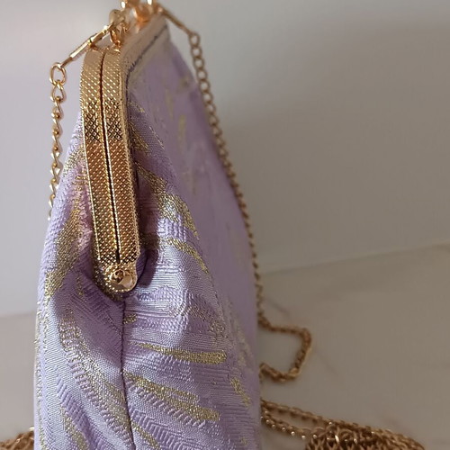 Vintage shoulder bag new in purple and gold shades with floral lining