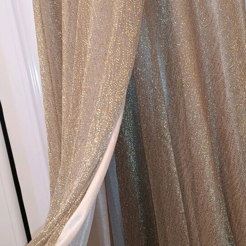 Official long dress new, gold color, fits small-medium