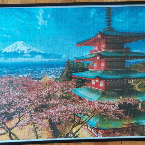 Framed puzzle like new, dimensions 0.53x0.73 m