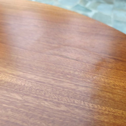Wooden extendable round dining table used