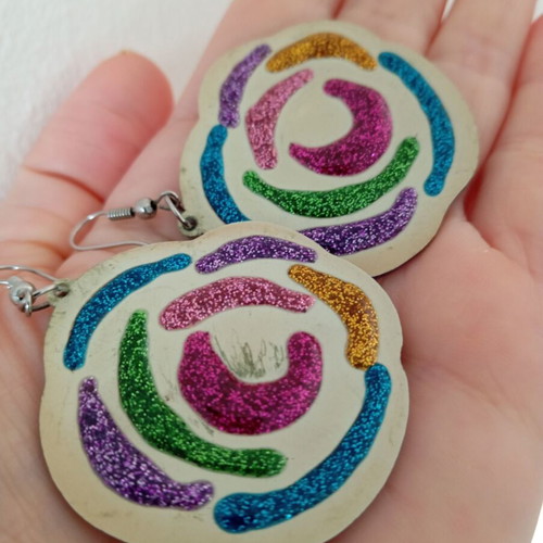 Plastic earrings used with glitter