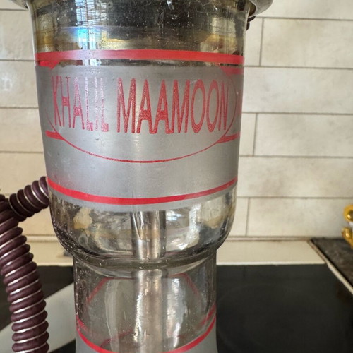 Khalil Maamoon Egyptian hookah used with tobacco cooling accessory and coals