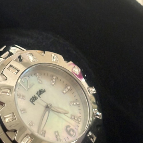 Folli Follie wristwatch new, elegant and shiny
