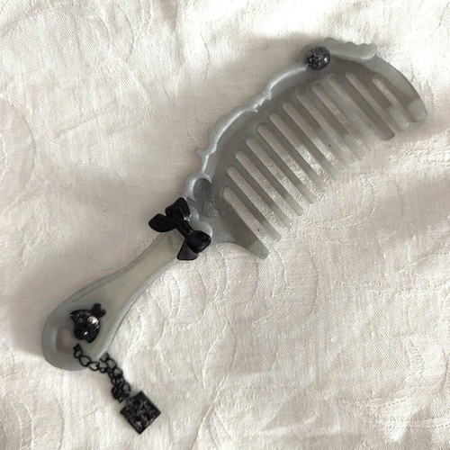 Goth comb like new, epoxy resin with charms