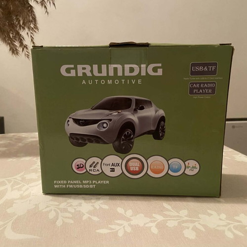 Grundig Automotive MP3 Radio Player new with remote control