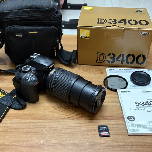 Nikon D3400 camera kit with DX VR 18-140mm lens, case and Sandisk memory
