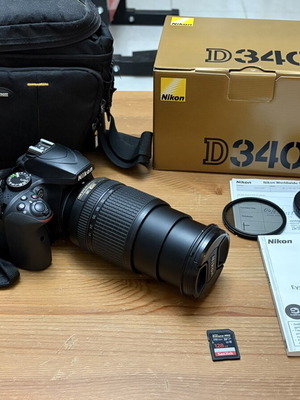 Nikon D3400 camera kit with DX VR 18-140mm lens, case and Sandisk memory