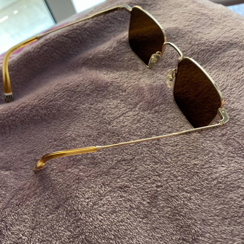 Gigi Hadid sunglasses authentic new gold with case and cloth