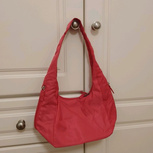 Nylon handbag like new, pink fluo with 3 compartments