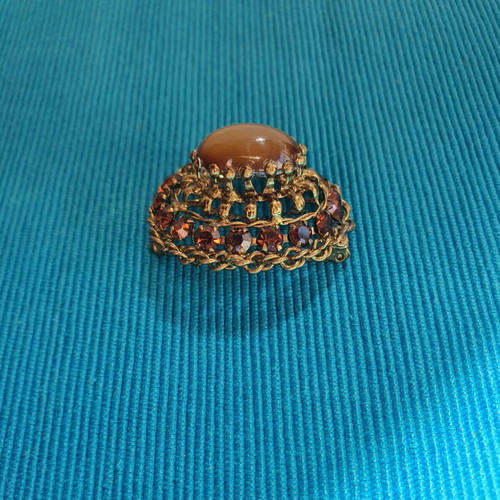 Vintage brooch used, gold color with crystals and cabochon
