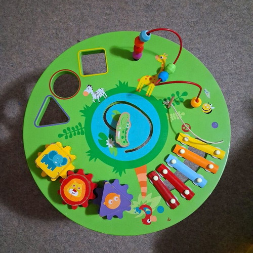Wooden activity table used for preschool children