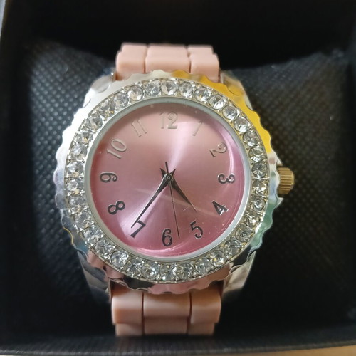Avon women's watch like new with pink silicone strap and rhinestones