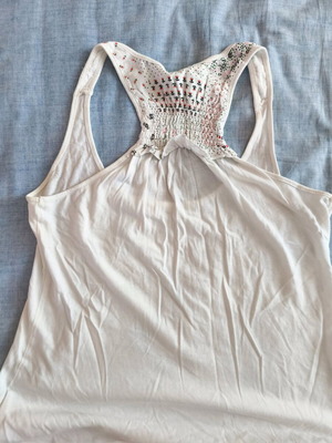 Women's white sleeveless top XSide size L like new