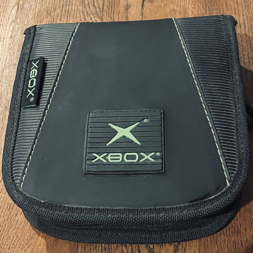 Xbox official licensed CD case used, holds 12 CDs, collectible
