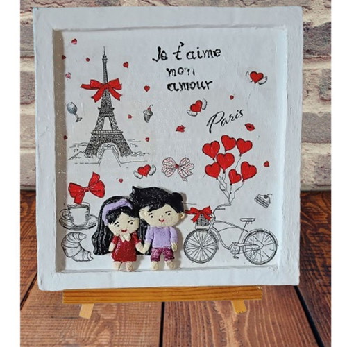 Handmade Saint Valentine frame with loving couple in Paris, new