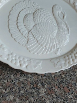 Large ceramic oval platter with embossed design like new