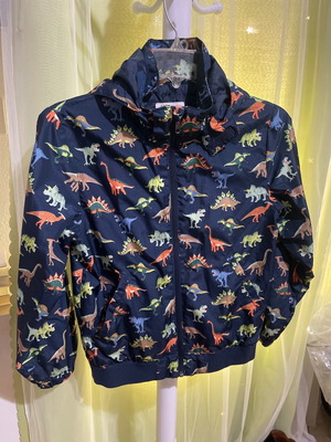 Children's seasonal jacket H&M with dinosaurs used, size 8-10 years