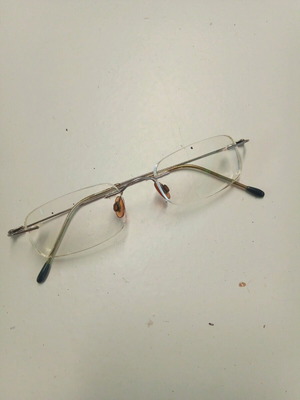 Wire glasses frame used, silver color