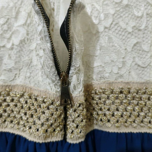 Sleeveless dress like new with white lace bust and blue skirt