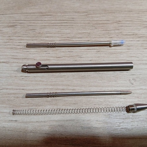 Mini titanium pen like new