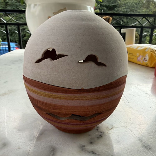 Handmade ceramic lantern with sailboat design, tealight holder