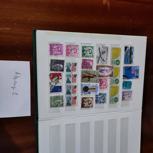 Various stamps used in 3 albums