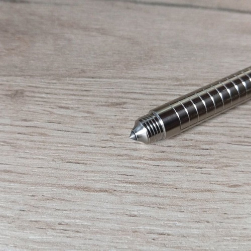 Mini titanium pen like new with Frag Pattern and carbide tip