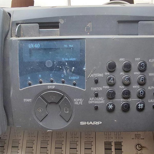 Sharp UX-40 Fax Phone used with speakerphone and thermal paper