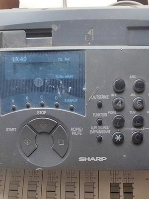 Sharp UX-40 Fax Phone used with speakerphone and thermal paper