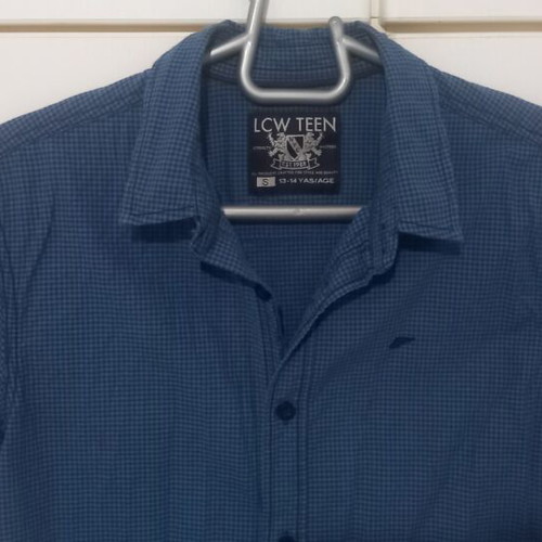Small short-sleeve shirt for 13-14 years old, like new, black and blue