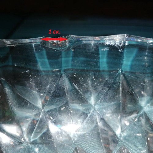 Oval glass platter for nuts used with small chip