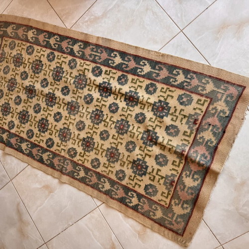 Handwoven rug used, 95 x 182 cm