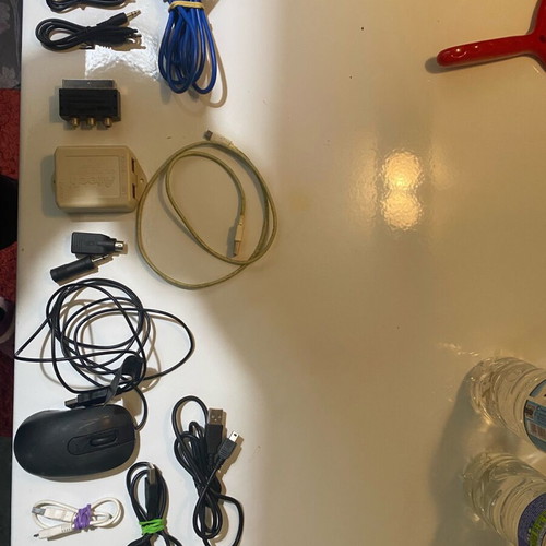 Various cables used with Microsoft mouse