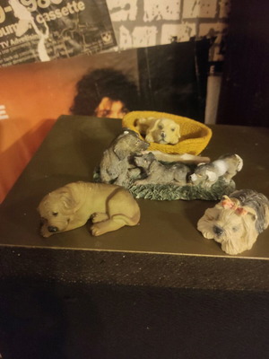 Vintage resin dogs used with minor wear